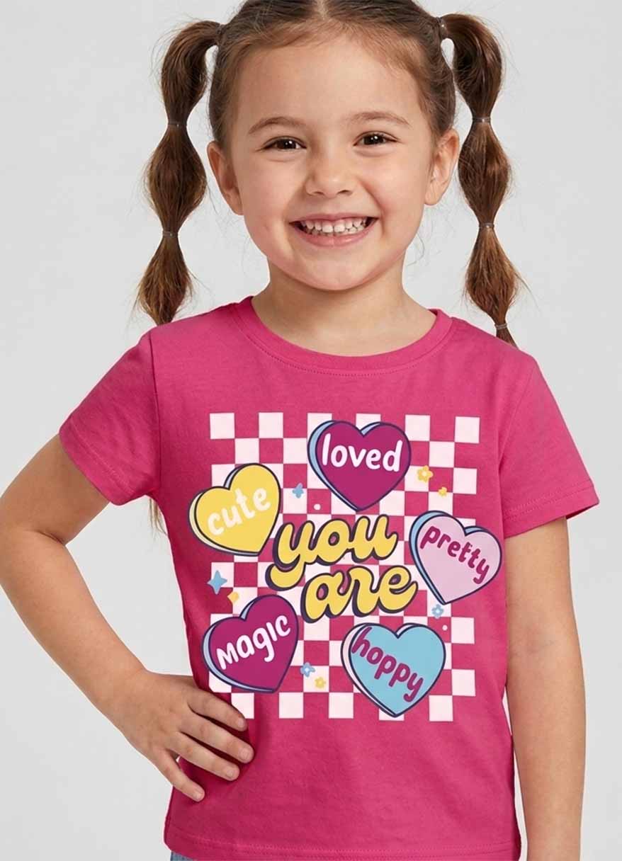 Girls' pink cotton t-shirt with colorful checkered hearts graphic print
