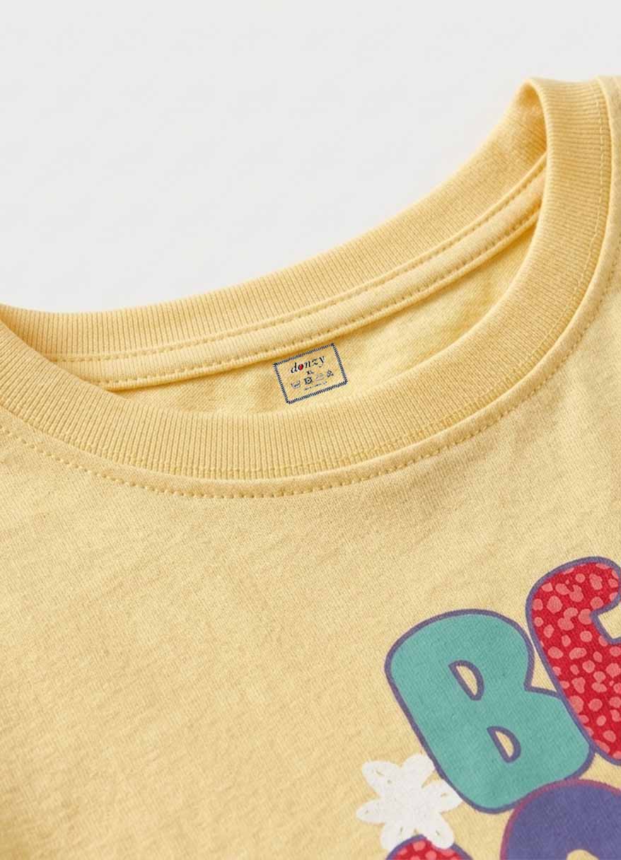 Girls' yellow cotton full sleeve t-shirt with Be More Happy typography print