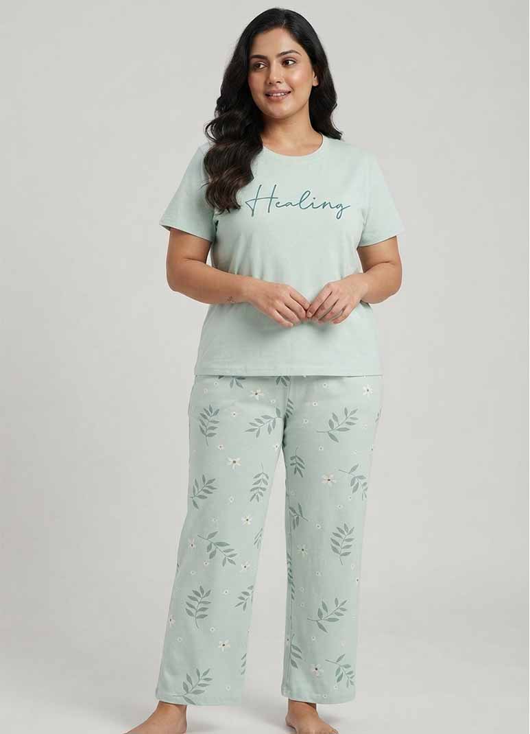Women's mint green pajama set with Healing typography top and leaf print pants