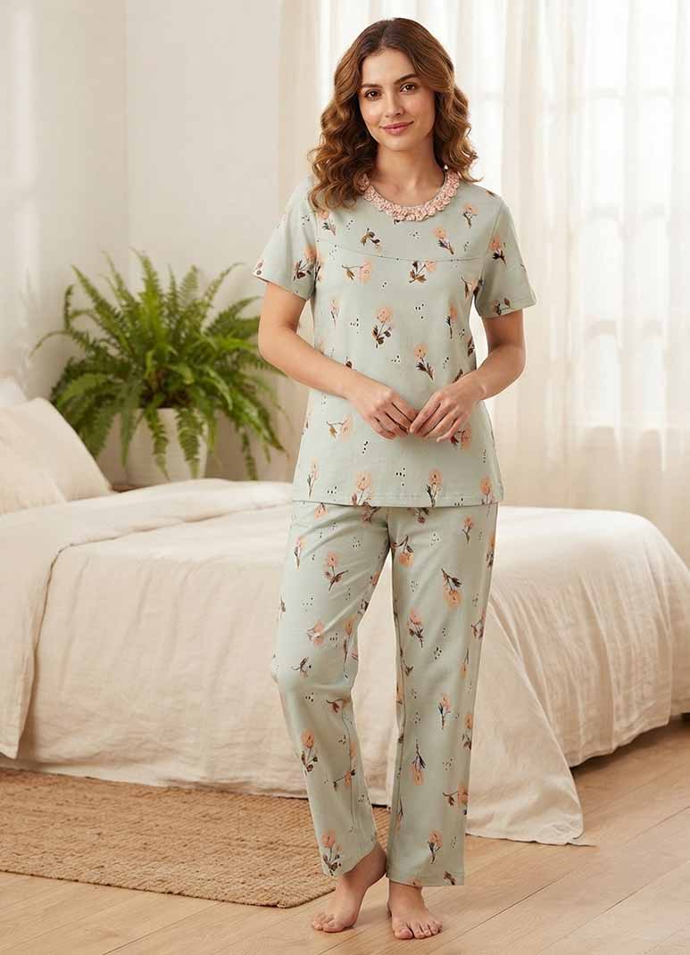 Women's sage green pajama set with lace collar top and floral print pants