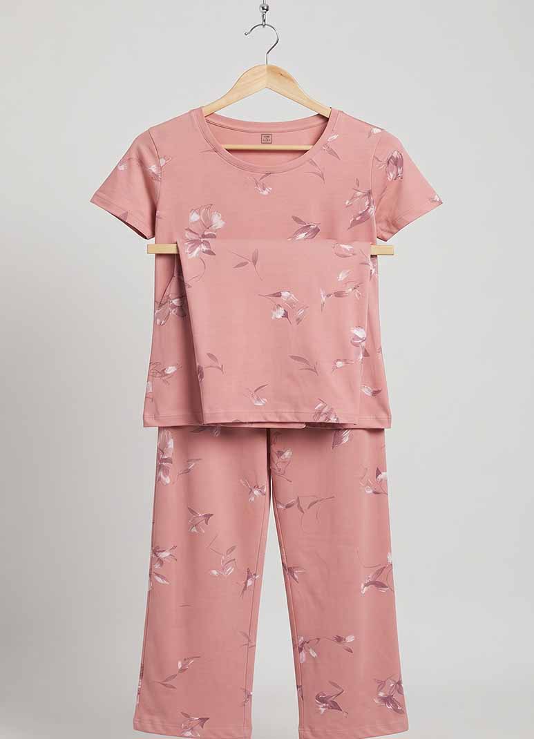 Women's dusty rose pajama set with floral print top and matching pants