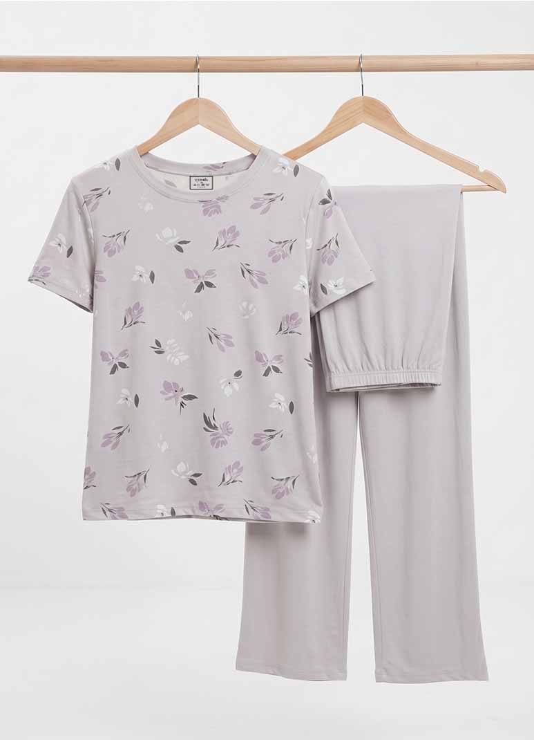 Women's grey pajama set with floral print top and solid pants